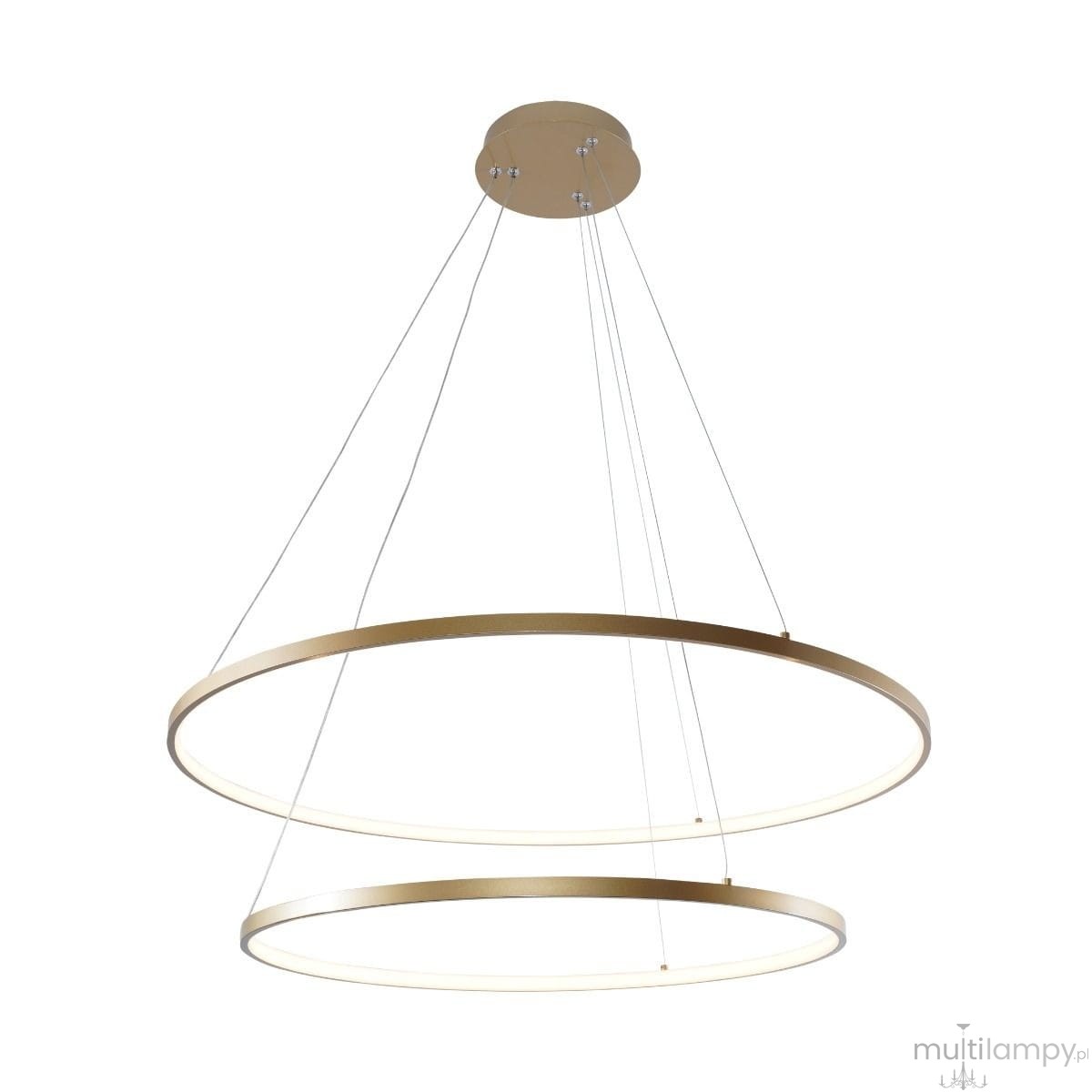 Lampa wisząca Breno D80 w kolorze złotym, składająca się z dwóch okrągłych pierścieni LED o średnicy 60 cm. Zawieszona na cienkich linkach, z metalowym stelażem. Wbudowane oświetlenie LED zapewnia nowoczesne i energooszczędne oświetlenie.