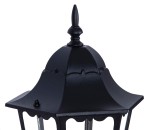 Czarna lampa ogrodowa Lozana H51 z metalowym, zdobionym daszkiem i dekoracyjnym, stożkowatym szczytem. Produkt ma przezroczyste ścianki, co umożliwia wydobycie światła. Ujęcie w zbliżeniu na górną część lampy, ukazujące detale konstrukcji.