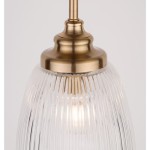 Lampa wisząca Ahigal z żarówką E14, w kolorze złotym, z przezroczystym kloszem o fakturze prążkowanej. Ujęcie z góry pokazujące detal mocowania i źródła światła wewnątrz klosza. Tło jasne dla lepszej widoczności produktu.