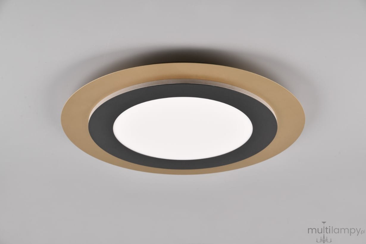 Plafon Morgan z pilotem, 1xLED/42W, w kolorze czarnym i złotym. Okrągła konstrukcja z białą oprawą LED, otoczona czarnym pierścieniem i złotą ramką. Ujęcie z dołu, produkt zamontowany na suficie, na jednolitym tle.