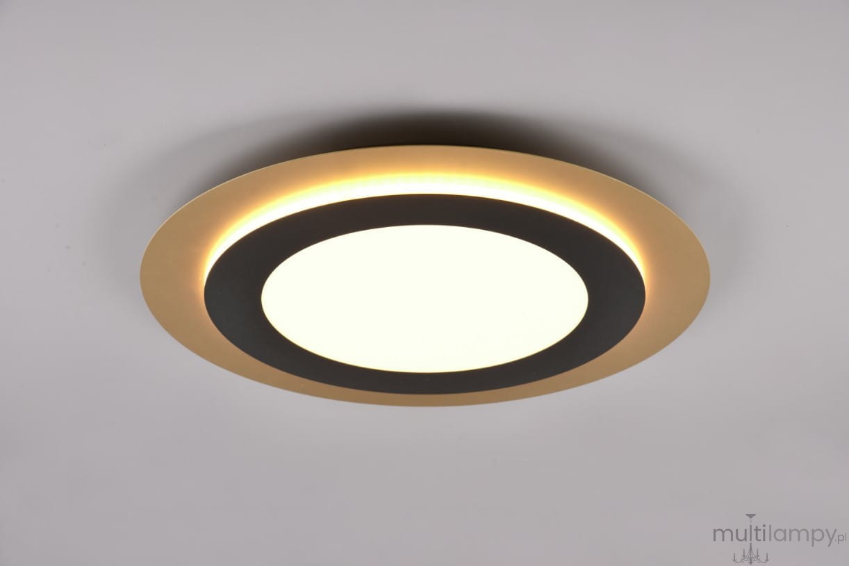 Plafon Morgan z pilotem, 1xLED/42W, w kolorze czarnym i złotym. Okrągła konstrukcja z matowym kloszem, otoczona złotą ramką i czarnym pierścieniem. Montaż na suficie, widoczne delikatne podświetlenie.