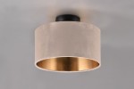 Lampa sufitowa Julieta o kształcie cylindrycznym, w kolorze jasnego beżu z metalowym złotym wnętrzem. Zamontowana na okrągłej czarnej podstawie. Umożliwia zastosowanie dwóch żarówek E14. Wisi prosto w centralnej części sufitu.