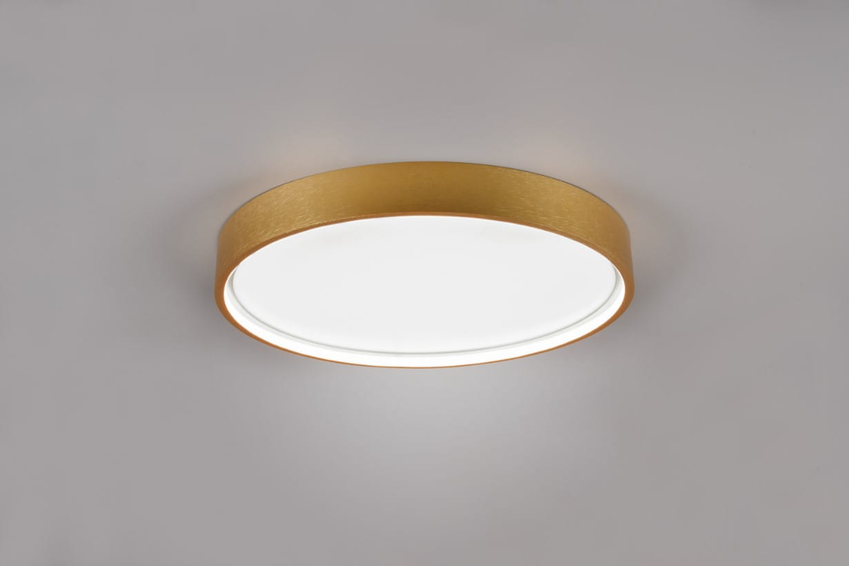 Plafon Doha 1xLED/29W w kolorze mosiądzu, o okrągłym kształcie i matowej powierzchni. Montowany na suficie, z białą, oświetlającą częścią w centrum. Prosta forma, idealny do nowoczesnych wnętrz.