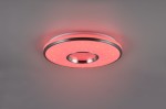 Plafon Realta z pilotem w kolorze czerwonym, wykonany z aluminium, z okrągłym kształtem i centralnym otworem. Emituje światło LED 24W, z dekoracyjnymi gwiazdami na powierzchni. Zawieszony na jasnym tle, widoczny z frontalnego kąta.