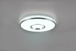 Plafon Realta w kolorze aluminium, okrągły, z centralnym otworem, z pilotem, z diodą LED o mocy 24W. Montowany na suficie, emituje białe oraz kolorowe światło RGB, idealny do nowoczesnych wnętrz.
