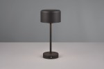Czarna lampa stołowa Jeff z jedną żarówką LED 1,5W, z cylindrycznym kloszem na cienkiej podstawie. Ujęcie frontalne, produkt stoi na gładkiej powierzchni. Widoczny mały przycisk na podstawie.