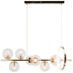 Lampa wisząca Galaxy z metalową, złotą konstrukcją, zawierająca siedem przezroczystych kul E14 oraz jedną diodę LED. Produkt zawieszony na cienkich linkach, w kształcie prostokąta z dodatkowym okrągłym detalem.