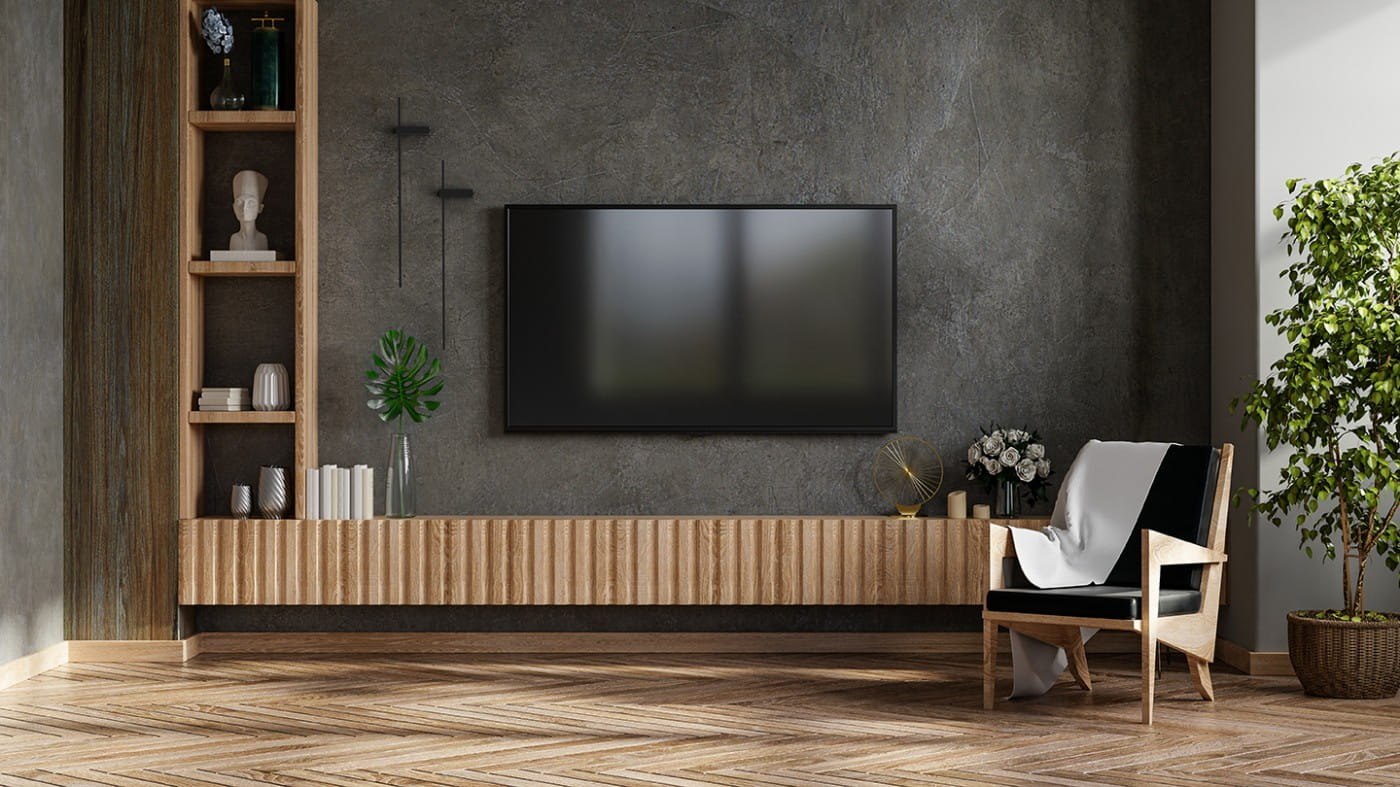 Czarny kinkiet Motive 120 z jedną żarówką LED o mocy 16W i temperaturze barwowej 4000K. Zawieszony na ścianie, minimalistyczny design, idealny do nowoczesnych wnętrz. W tle telewizor i drewniana szafka.
