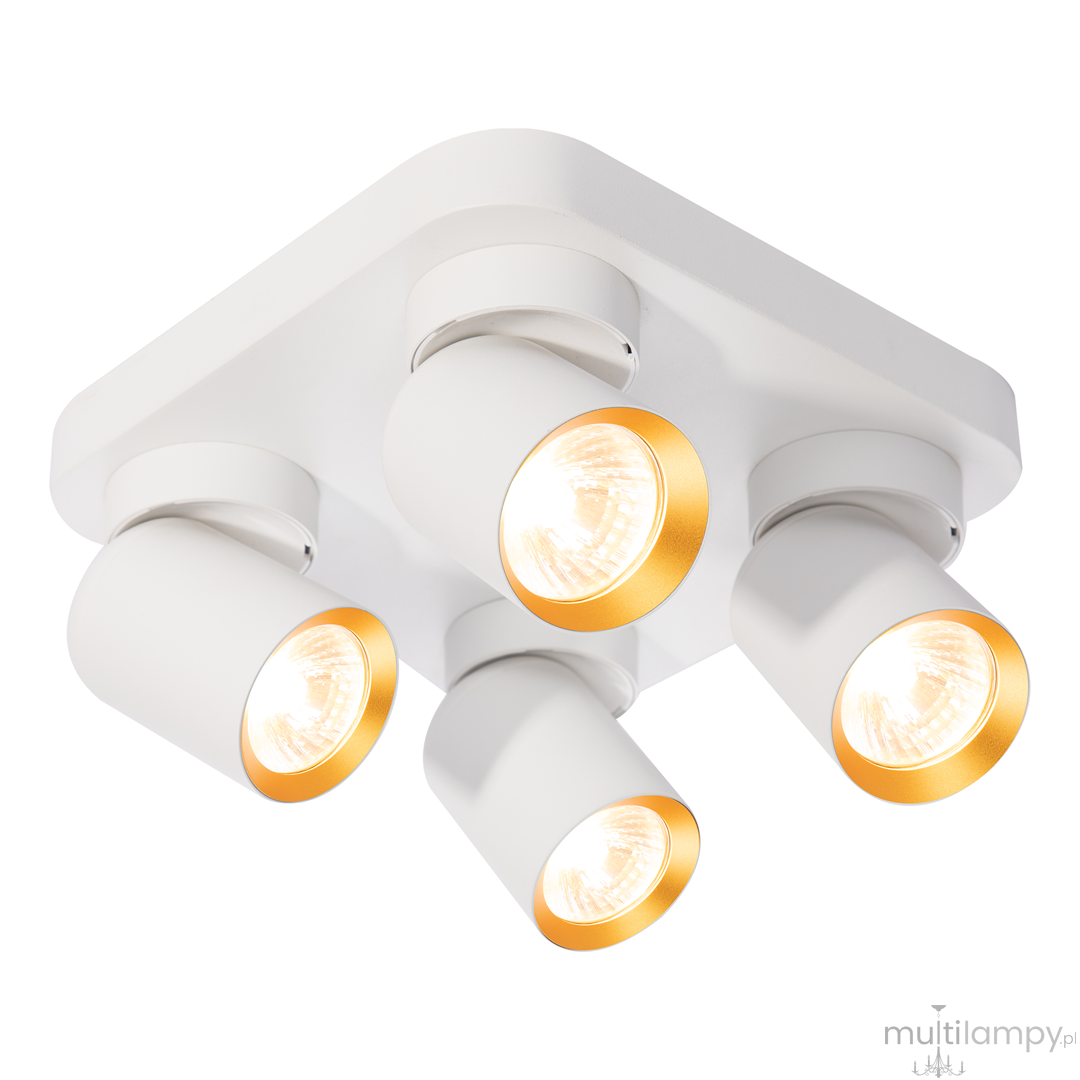 Lampa sufitowa Andy z czterema spotami w białym kolorze, z metalowymi złotymi obręczami wokół źródeł światła. Produkt montowany na suficie, z widocznymi detalami, w tym gładką powierzchnią i minimalistycznym designem.