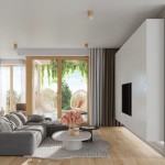 Lampa sufitowa Boomo 8, wykonana z naturalnego drewna, z oprawą na żarówkę G9. Ujęcie z wnętrza nowoczesnego salonu, z widokiem na balkon i roślinność w tle. Lampa umieszczona na suficie, obok okna z drewnianymi ramami.