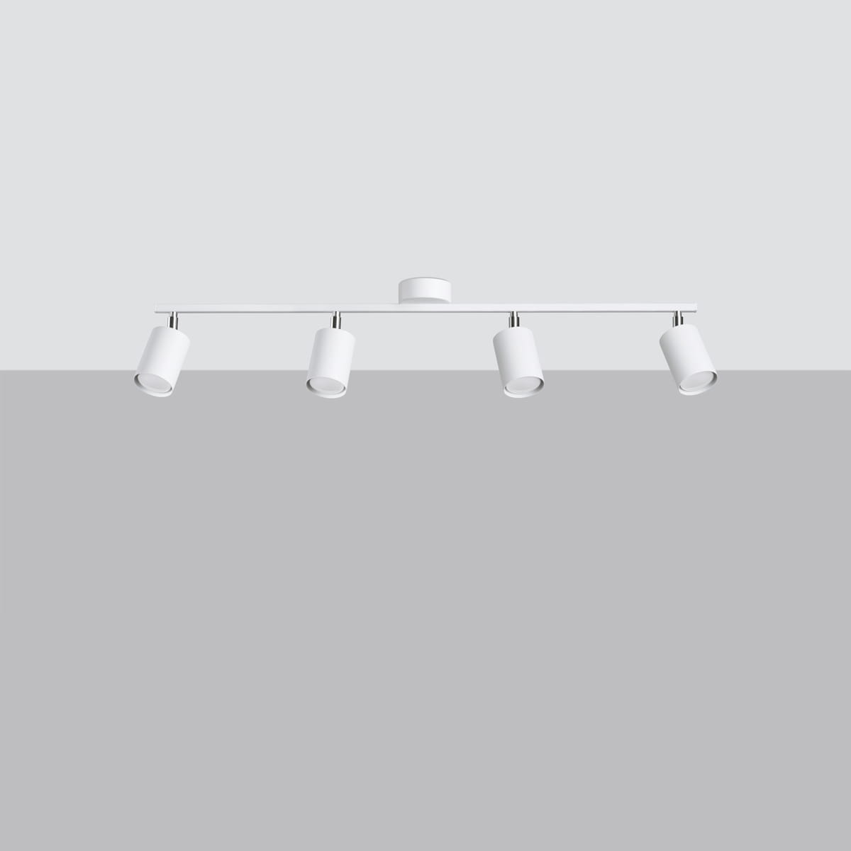Lemmi lampa sufitowa w kolorze białym z czterema oprawami na żarówki GU10. Ułożona poziomo, z widocznymi cylindrycznymi kloszami, montowana pod sufitem. Prosta, nowoczesna konstrukcja, idealna do oświetlenia wnętrz.