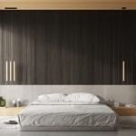 Lampa wisząca Pastelo 3xG9 w kolorze czarnym z drewnianymi elementami, zawieszona w nowoczesnym wnętrzu. Widoczny minimalistyczny design, pasujący do aranżacji sypialni z ciemnym drewnem na ścianie.