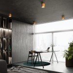 Lampa sufitowa Mika 1xGU10 w kolorze złotym, zamontowana na ciemnym suficie. W tle widoczna przestrzeń biurowa z drewnianymi panelami, biurkiem i rośliną, zapewniająca nowoczesny kontekst użytkowania.