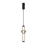 Lampa wisząca Bruni w kolorze czarnym, z jednym źródłem LED o mocy 19W. Kształt cylindryczny z przezroczystym kloszem i dekoracyjnymi detalami. Zawieszona na cienkim czarnym przewodzie, z okrągłym mocowaniem sufitowym.