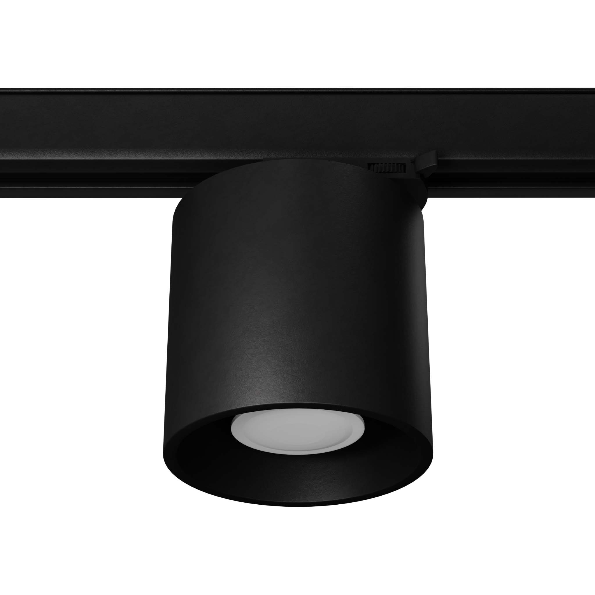 Czarna lampa tuba Orbis z żarówką GU10 7W/4000K, zamontowana na szynie 3F. Kształt cylindryczny, matowa powierzchnia, widoczna soczewka w dolnej części. Ujęcie z boku, pokazujące charakterystyczny design i sposób montażu.