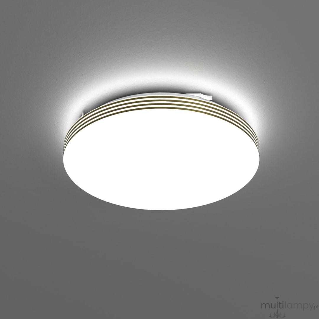 Plafon LED Bever D26 w kolorze białym z złotymi detalami, okrągły, o średnicy 26 cm. Zainstalowany na suficie, emituje neutralne światło 4000K. Wyposażony w ochronę IP44, idealny do łazienek lub przestrzeni narażonych na wilgoć.