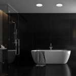 Plafon LED Vera D28 o mocy 24W i barwie 4000K, okrągły, biały. Zainstalowany w łazience, na ciemnym tle, oświetlający przestrzeń nad wanną. Świetnie komponuje się z nowoczesnym wystrojem wnętrza.