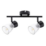 Czarna lampa sufitowa typu spot z dwoma reflektorami, każdy z przezroczystym kloszem o żłobkowanej fakturze. Elementy metalowe w matowym wykończeniu. Umożliwia zastosowanie żarówek E14. Produkt zamontowany na prostokątnej podstawie.