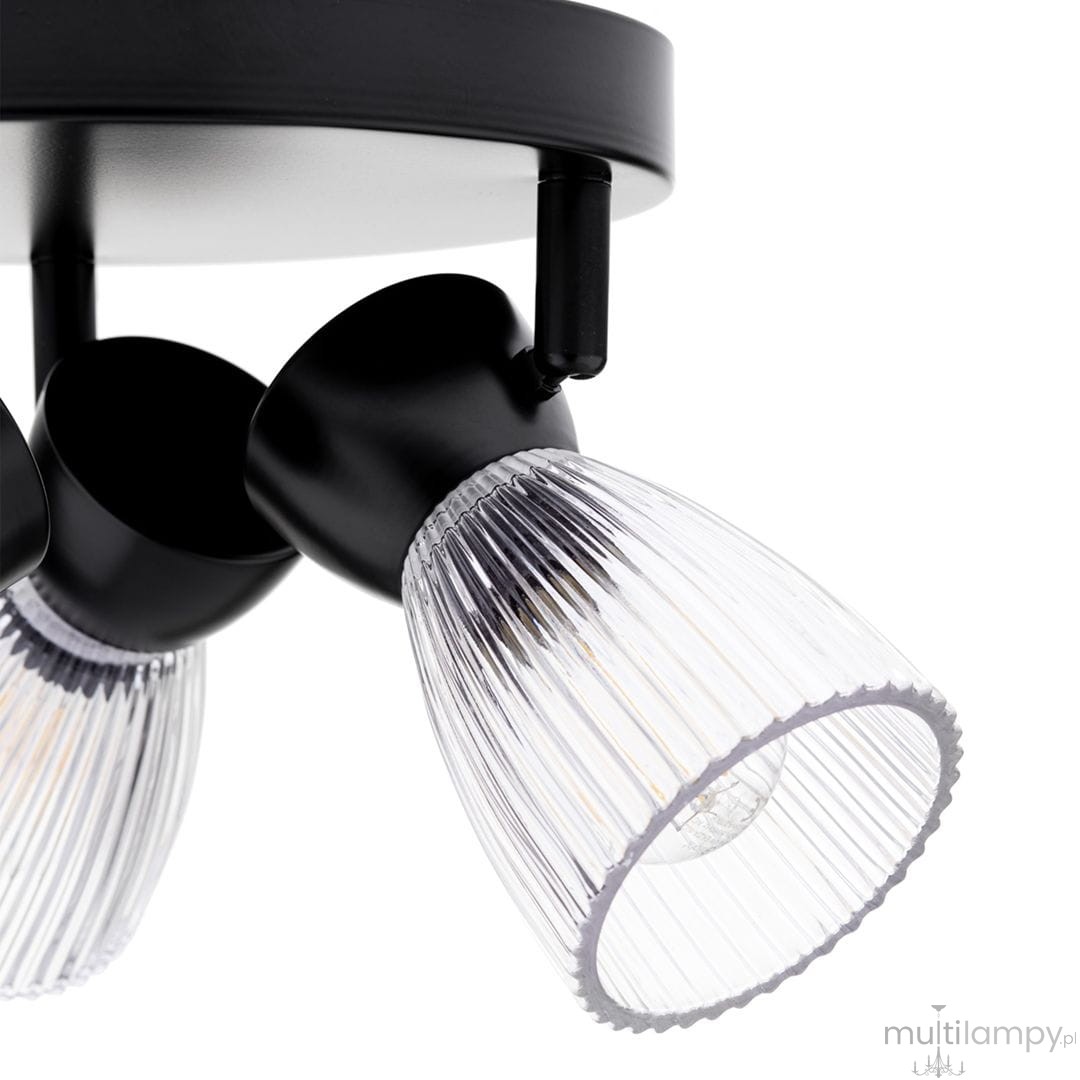 Czarna lampa sufitowa typu spot z trzema oprawami E14. Każda oprawa ma przezroczysty, teksturowany klosz z pionowymi żłobieniami, zamontowana na okrągłej podstawie. Ujęcie z boku, ukazujące detale kloszy i mocowania.