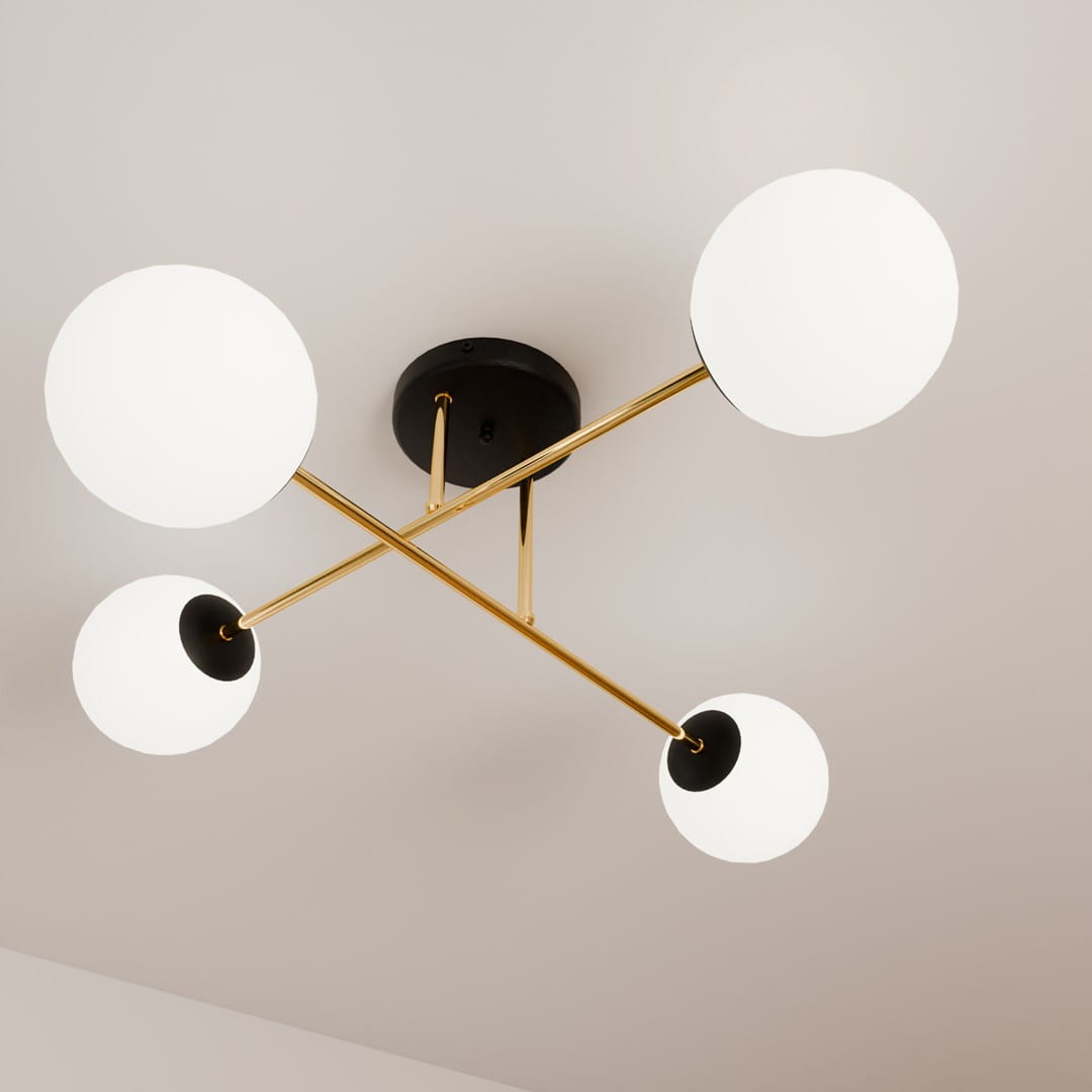 Czteropunktowa lampa sufitowa Magnum w kolorze czarnym, złotym i białym, z okrągłymi, białymi kloszami, zamontowana na czarnej podstawie. Klosze umieszczone na złotych ramionach w układzie krzyżowym. Widok z dołu.