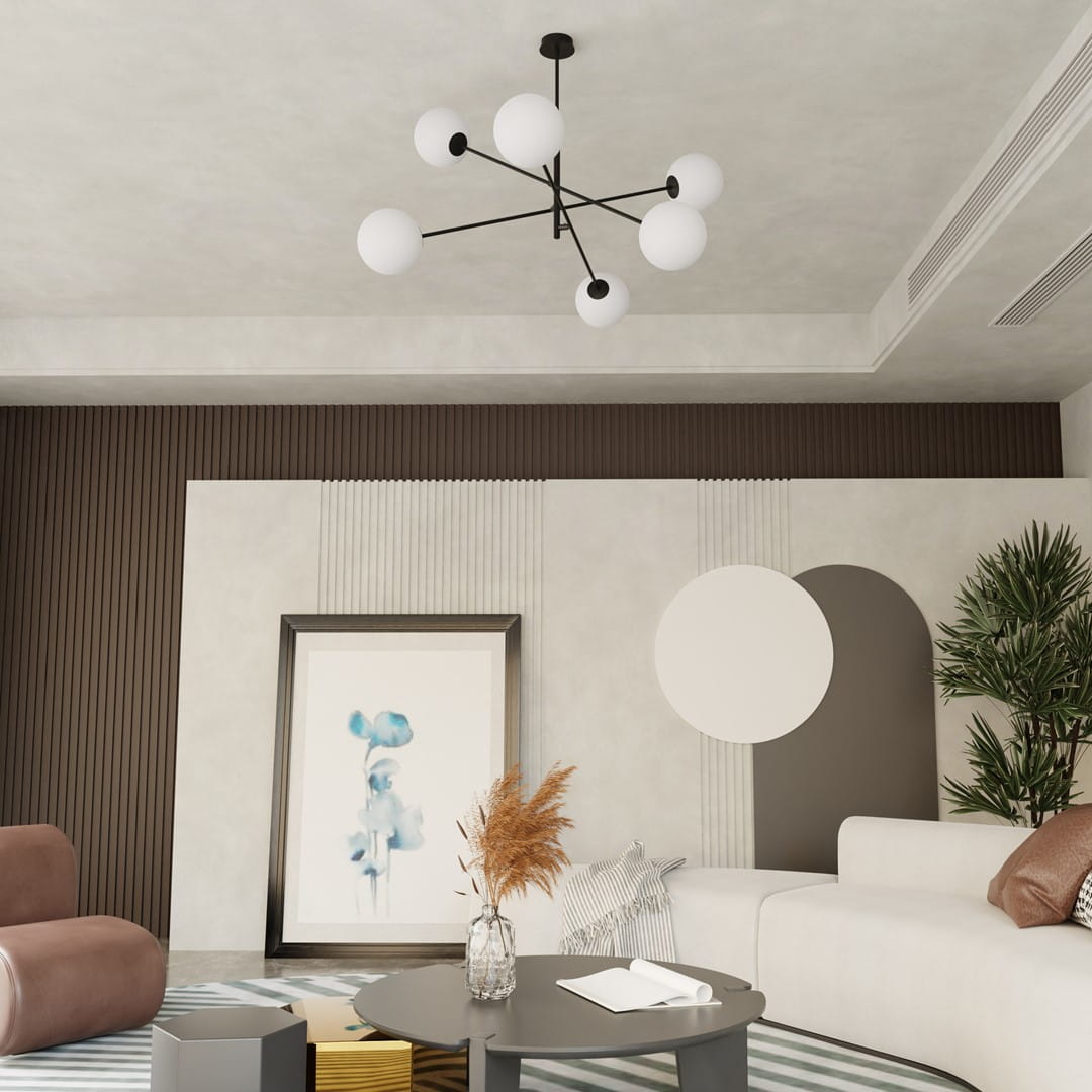 Linear lampa wisząca 6-punktowa w kolorze czarnym i białym, z sześcioma okrągłymi kloszami z białego szkła, zamontowana na czarnym stelażu. Lampa wisi w nowoczesnym wnętrzu z jasnymi i ciemnymi akcentami, w otoczeniu mebli i dekoracji.