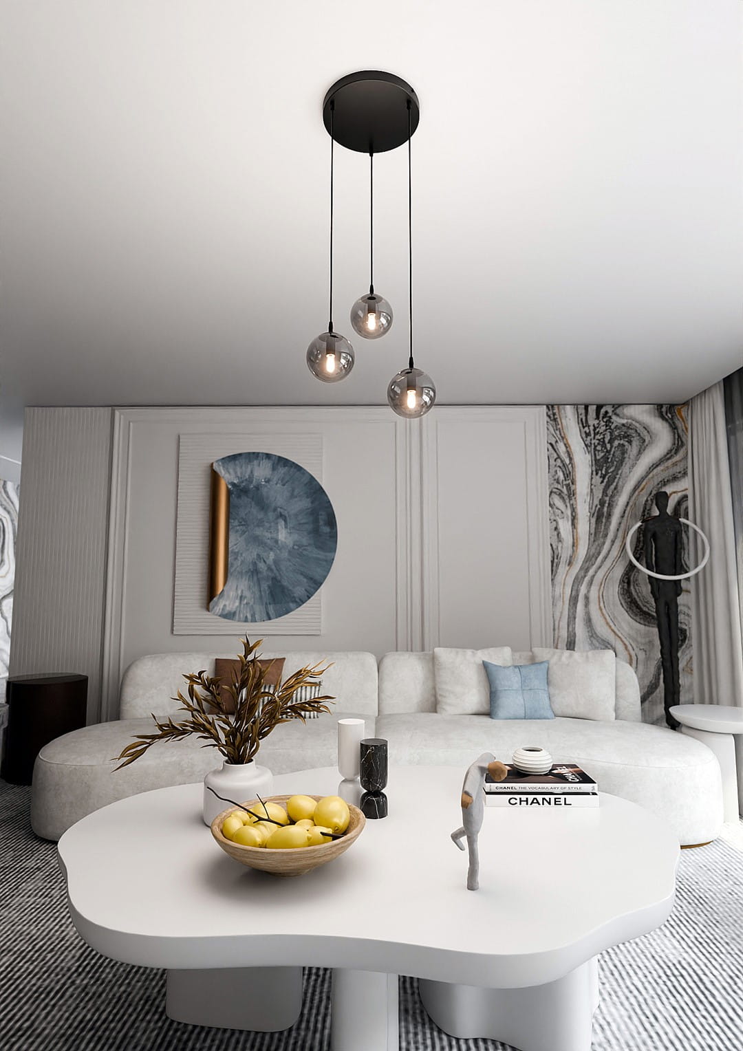 Lampa wisząca Cosmo Premium 3-punktowa w kolorze grafitowym, zawieszona na trzech cienkich linkach, z transparentnymi kloszami. Widoczna w nowoczesnym wnętrzu z sofą i dekoracjami, na jasnym tle.