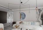 Lampa wisząca Gigi 5-punktowa w multikolorze, z przezroczystymi kloszami w kształcie kul. Ułożona na czarnych przewodach, zwisa z sufitu w nowoczesnym wnętrzu. Tło z jasnymi ścianami i dekoracyjnym panelem dopełnia aranżację.
