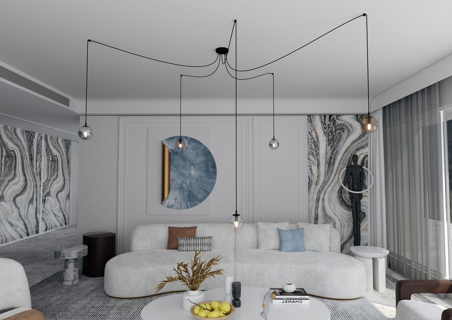 Lampa wisząca Gigi 5-punktowa w kolorze multikolor, zawieszona na czarnych przewodach. Posiada przezroczyste klosze w różnych kształtach. Produkt znajduje się w nowoczesnym wnętrzu z jasną sofą i dekoracyjnymi elementami na tle marmurowej ściany.