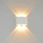 Kinkiet elewacyjny Ortelo w kolorze białym z czterema diodami LED (4W) emituje światło w górę i w dół, tworząc efekt świetlny na ścianie. Okrągły kształt, zamontowany na gładkiej powierzchni.