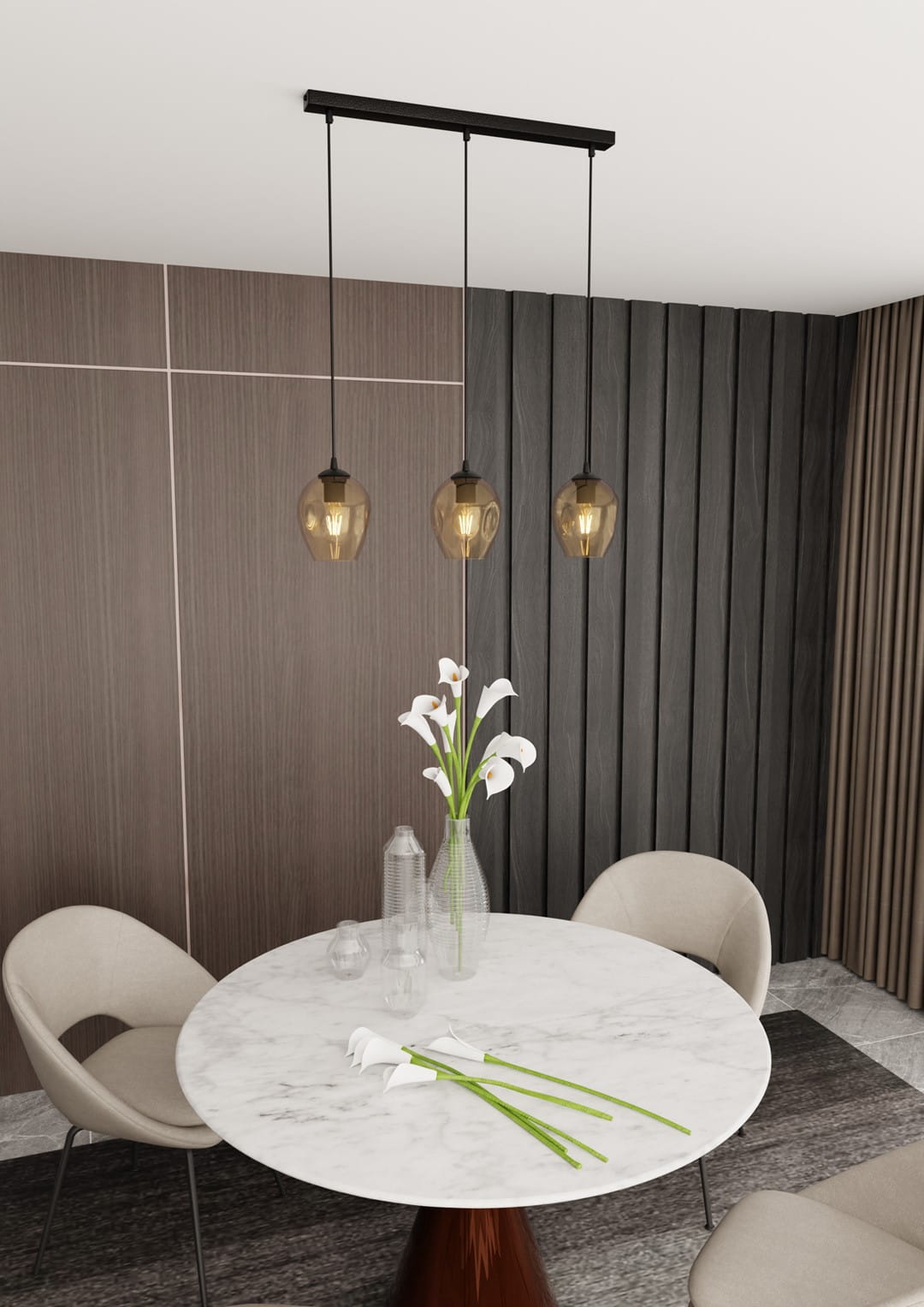 Lampa wisząca Istar 3-punktowa w kolorze miodowym z trzema szklanymi kloszami w kształcie owalnym. Zawieszona na czarnej listwie, umieszczona nad okrągłym stołem z marmurowym blatem, w nowoczesnym wnętrzu z drewnianymi panelami.