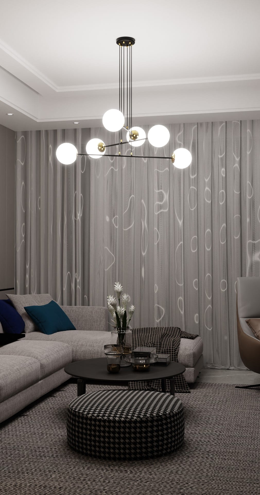 Lampa wisząca Ognis 6-punktowa w kolorze czarnym, z sześcioma okrągłymi kloszami w białym kolorze, zawieszona na cienkich linkach. Ujęcie z dołu, w aranżacji nowoczesnego salonu z szarymi zasłonami i meblami.