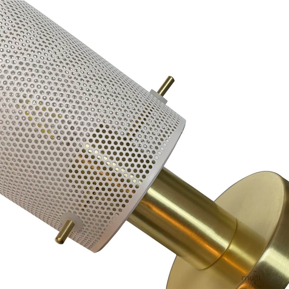 Lampa stołowa Tirana 1xE27 w kolorze złotym i białym, z dekoracyjnym, perforowanym kloszem oraz metalową podstawą. Ujęcie z góry, pokazujące detal mocowania i teksturę materiałów.