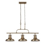 Lampa wisząca Dallas w kolorze antycznego mosiądzu z trzema kloszami. Posiada metalową konstrukcję z łańcuchami. Klosze mają kształt dzwonu, a całość zawieszona jest na prostokątnej podstawie sufitowej.