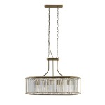Lampa wisząca Victoria z antycznego mosiądzu, z pięcioma miejscami na żarówki E27. Okrągła, metalowa konstrukcja z wiszącymi, przezroczystymi kryształkami, zawieszona na łańcuchu. Idealna do nowoczesnych wnętrz.