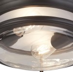 Czarna lampa sufitowa Glasgow z podwójnym źródłem światła E27, IP44. Okrągła, szklana klosz z przezroczystym wykończeniem, widoczne żarówki. Ujęcie z bliska, pokazujące detale lampy i jej elegancki design.