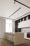 Czarna lampa wisząca Pastelo 1xG9, zawieszona na szynie 3F, umieszczona nad wyspą kuchenną. Kąt ujęcia z góry, pokazujący minimalistyczny design i nowoczesne wnętrze z drewnianą podłogą oraz metalowymi krzesłami.