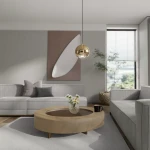 Złota lampa wisząca Aurenia z jedną żarówką LED 5W, o kulistym kształcie, zawieszona nad okrągłym stolikiem kawowym. Tło stanowi nowoczesny salon z szaro-beżową sofą i roślinnością.