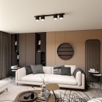 Czarna lampa sufitowa Nano z czterema gniazdami GU10/AR 111, zamontowana na suficie w nowoczesnym wnętrzu. Oświetlenie skierowane w dół, otoczone neutralnymi kolorami mebli i dekoracji, tworzy elegancką aranżację.