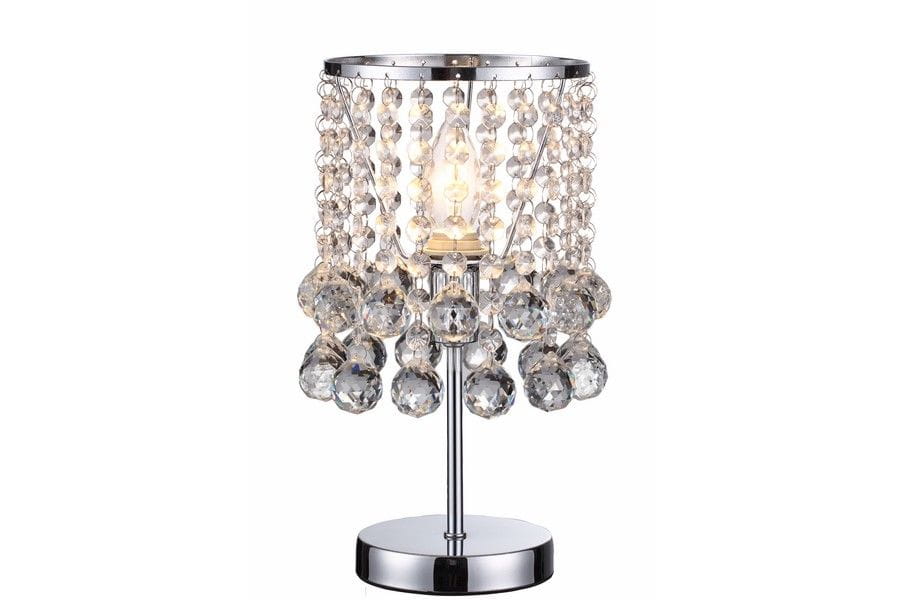 Lampa stołowa London Crystal z chromowaną podstawą i kloszem zdobionym przezroczystymi kryształkami. Źródło światła E14 umieszczone w centralnej części. Całość ma elegancki, dekoracyjny charakter, idealna do nowoczesnych wnętrz.