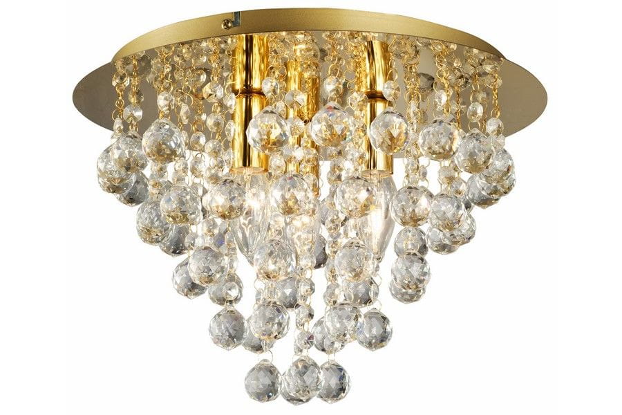 Lampa sufitowa London Crystal 3xE14 w kolorze złotym. Okrągła podsufitka z metalicznym wykończeniem, z wiszącymi kryształowymi kulami i koralikami, tworzącymi efektowne oświetlenie. Widoczna żarówka w centralnej części.