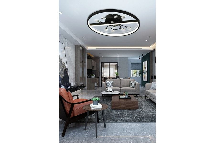 Lampa sufitowa Dacota 1xLED/24W w kolorze czarnym, okrągła konstrukcja z metalowymi detalami, zawieszona na suficie w nowoczesnym wnętrzu. W tle widoczne meble i dekoracje, jasne oświetlenie.