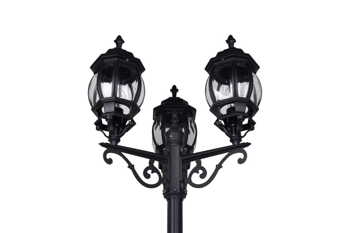 Lampa stojąca ogrodowa Elvo H240 w kolorze czarnym z trzema kloszami E27. Klosze o kształcie sześciokątnym, z przezroczystym szkłem. Ujęcie z dołu, pokazujące detale konstrukcji i dekoracyjne elementy metalowe.