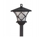 Lampa solarna ogrodowa z czujnikiem zmierzchu LED/H138 w kolorze czarnym. Posiada szklany klosz z geometrycznym wzorem i prostokątną podstawę. Ujęcie frontalne, stojąca na słupku, z widocznym panelem słonecznym na górze. Idealna do oświetlenia ogrodu.