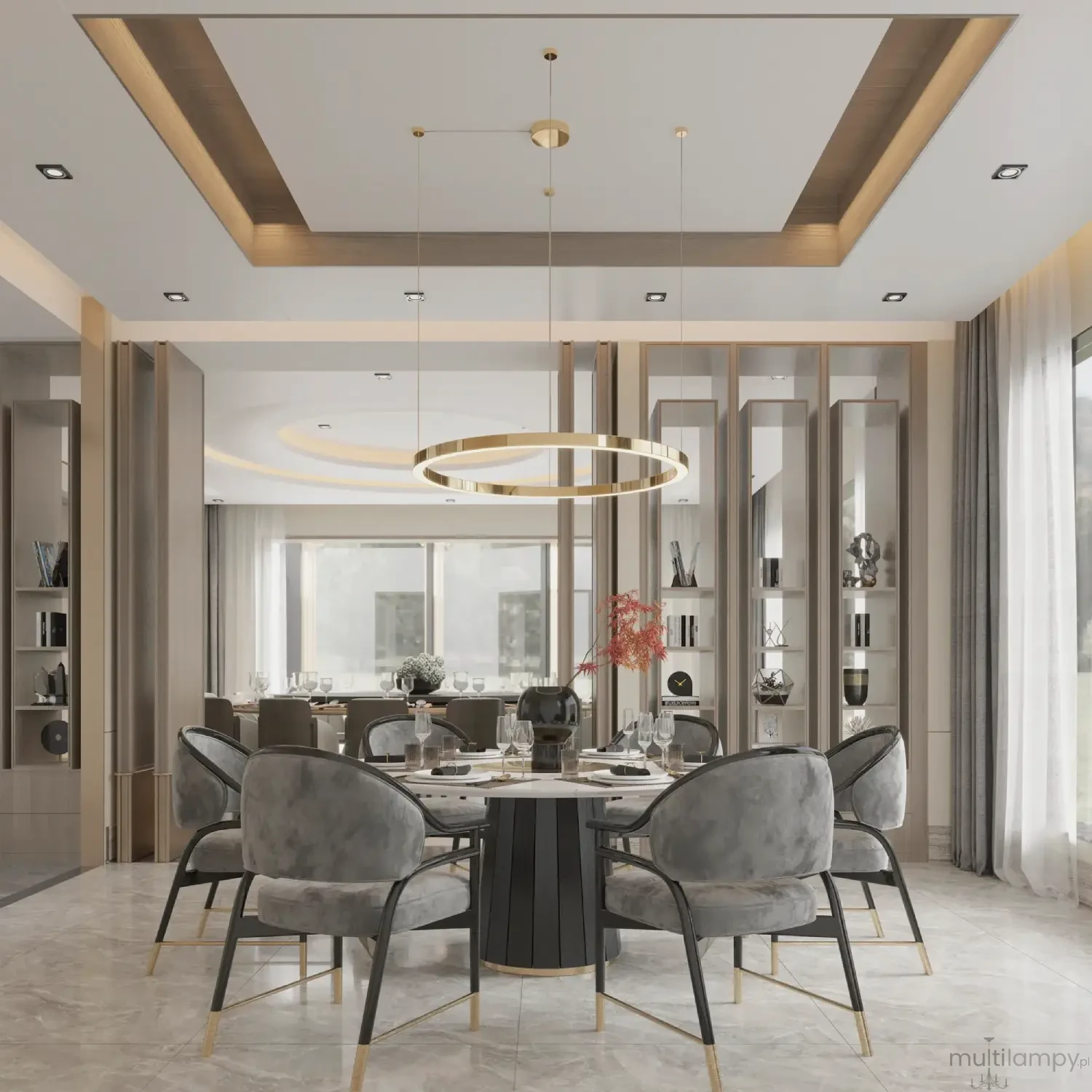 Złota lampa wisząca Aurum D120 z jedną diodą LED, o okrągłym kształcie, zawieszona na cienkich linkach. Widoczna w eleganckiej aranżacji jadalni z szarymi krzesłami i okrągłym stołem, w otoczeniu nowoczesnych mebli.