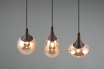 Lampa wisząca Lumina z trzema kloszami E14 w kształcie kropli, w kolorze czarnym i bursztynowym. Klosze mają metalowe wykończenie u góry, zawieszone na czarnych przewodach. Ujęcie frontalne, na szarym tle.