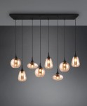 Lampa wisząca Lumina 8xE14 w czarnej obudowie z bursztynowymi kloszami, zawieszona na długich przewodach, z różnymi kształtami kloszy. Montowana do sufitu, w minimalistycznym stylu, na ciemnym tle.