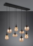 Lampa wisząca Lumina z 8 kloszami E14, czarna podstawa z metalowymi zawieszeniami. Klosze w kształcie kropli, bursztynowe, z przezroczystym wykończeniem, zawieszone na różnych wysokościach na tle szarej ściany.