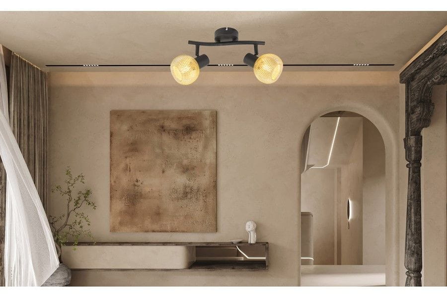 Lampa sufitowa Loretto z dwoma reflektorami E14 w kolorze czarnym i złotym, zamontowana na długim, poziomym ramieniu. Reflektory mają okrągły kształt i teksturowaną powierzchnię.