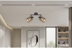 Lampa sufitowa Tuluza w kolorze czarnym, z dwoma reflektorami na regulowanym ramieniu. Klosze z dekoracyjnym wzorem, oświetlające przestrzeń w nowoczesnym wnętrzu. Montaż na suficie, widok z dołu.