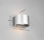 Kinkiet zewnętrzny Talent w kolorze tytanowym, z czujnikiem ruchu i zmierzchu. Oświetlenie LED 2x1W, okrągły kształt. Wymiary: 160mm szerokości, 115mm wysokości, 100mm głębokości. Montowany na ścianie.